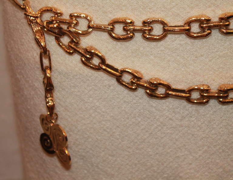 Chanel Vintage Gold Large Link Chain Belt - circa 80's  This one of kind chanel belt has a hammered like texture to the links. It is a beautiful piece and a collectors dream come true. It is in excellent condition.
Measurements: 
Max length 40