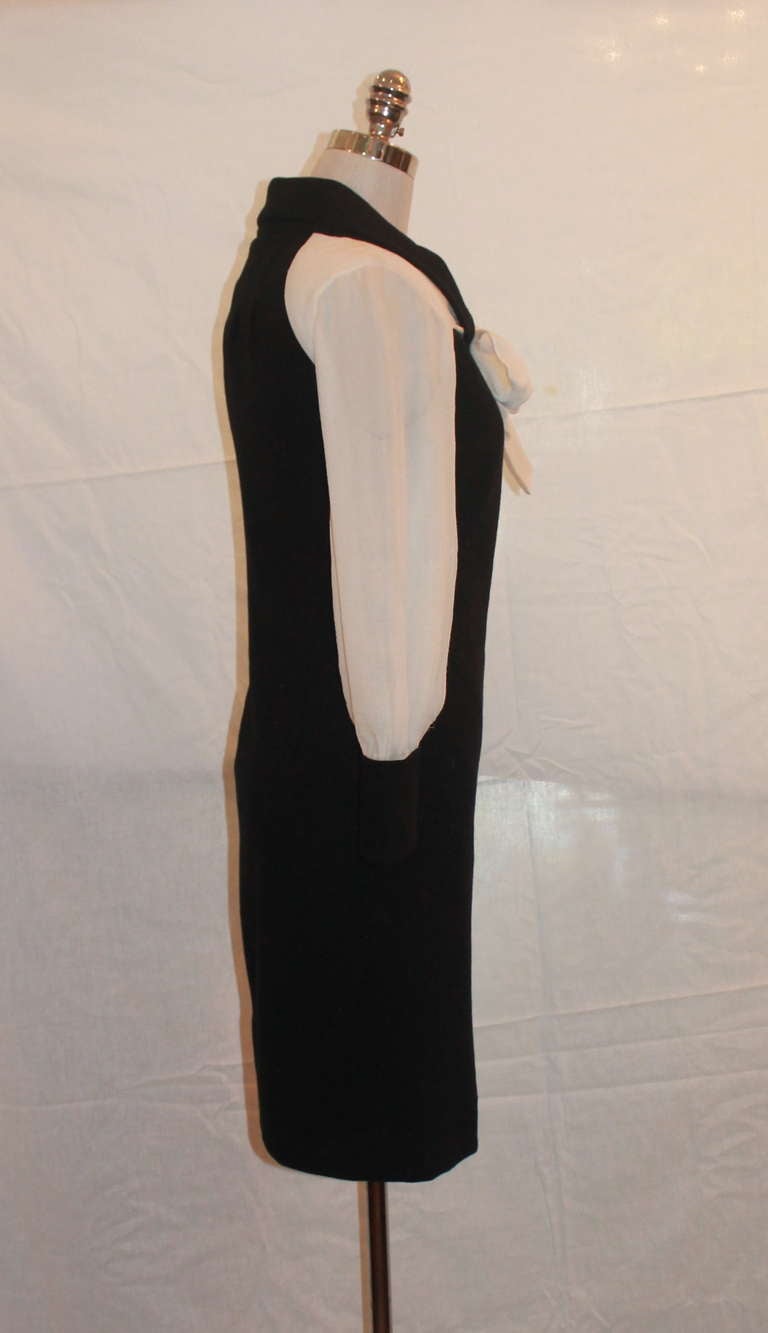 Chanel Black and Ivory Wool Crepe and Silk Chiffon Dress - sz 40 This beautiful dress is in excellent condition.
Measurements:
Bust 36