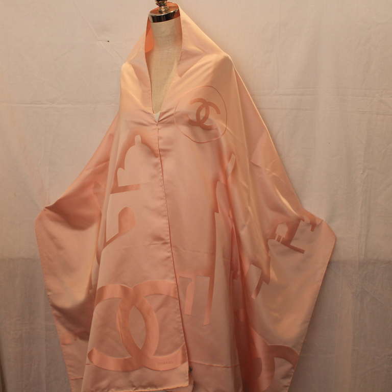 Chanel Pink on Pink Silk Stole with Empire State Building and Eiffel Tower Motif. This stole is in excellent condition with no visible stains. 
Measurements: 
Length- 89