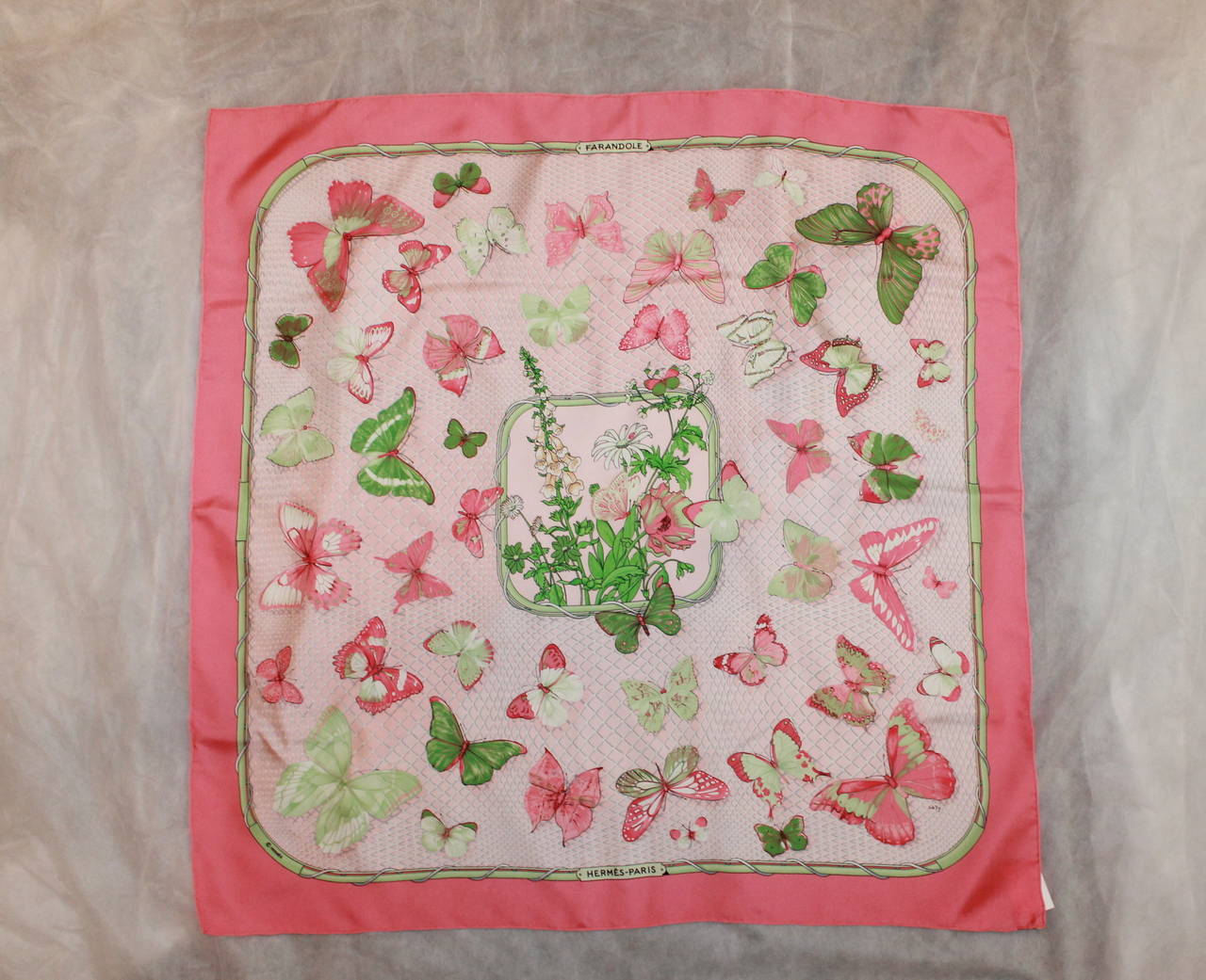 Hermes Pink and Green Butterfly Print Scarf in Very Good Condition.

Measurements:
34.75