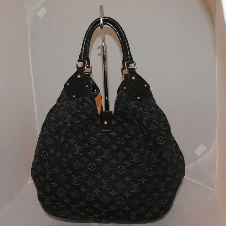 Louis Vuitton Black Denim Mahina XL Limited Edition Handbag  This bag is in excellent condition. Comes with Duster

Measurements:
Height 14