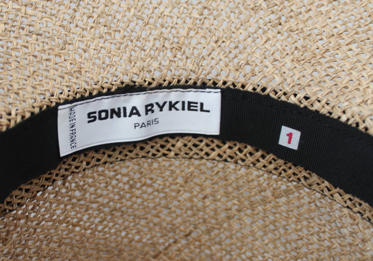 Women's Sonia Rykiel beige straw hat with black ribbon detail