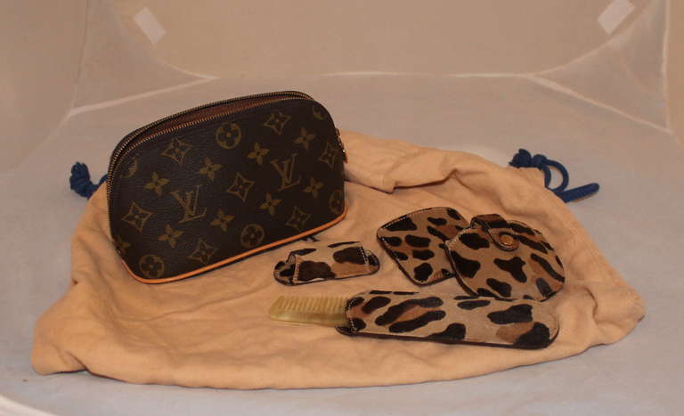 Louis Vuitton Centenaire Monogram Alma Bag By Azzedine Alaia - Circa 1996. The bag includes a makeup case, lipstick holder, compact holder, comb & comb holder, small container, and duster. Bag is in impeccable condition. 
Measurements:
Height-