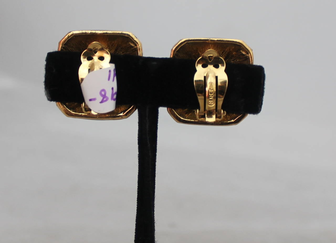 1990s Ciner Black Enamel and Goldtone Earrings with Green Center In Excellent Condition In West Palm Beach, FL