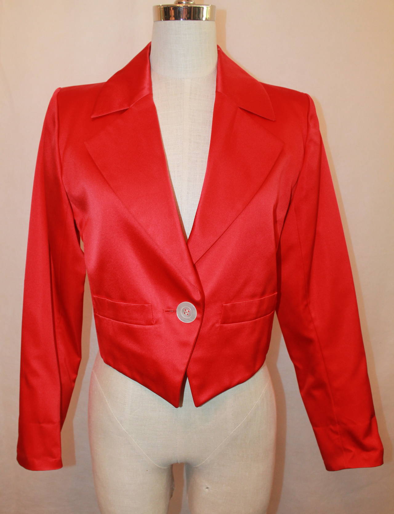 Vintage 1990s Yves Saint Laurent Red Size 36 Satin Bolero Jacket with Single Mother of Pearl Button.

Measurements:
Bust: 38 