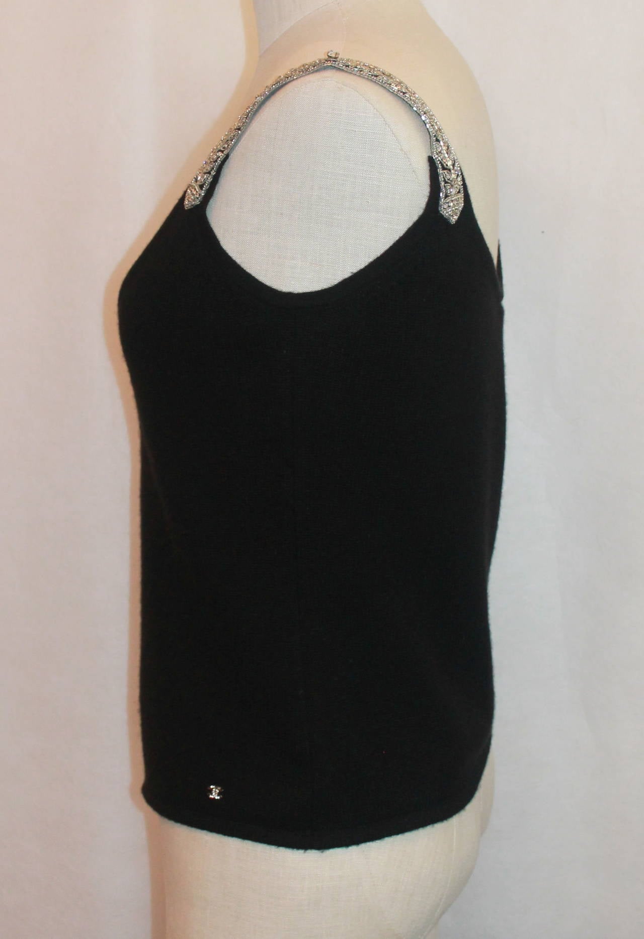 Chanel 2004 Black Cashmere Tank with Rhinestone Straps - 42. This top is in good condition with the cashmere having some wear. The straps have beading and rhinestone embellishing.

Measurements:
Bust- 36 - 40