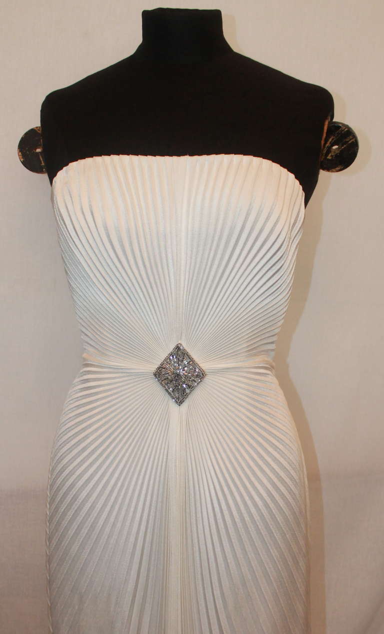 Loris Azzaro Vintage Ivory Silk Pleated Strapless Gown - Circa 70's Gown has a barrel beaded diamond shape detail in the front. This dress is a French size 34. The gown is in good vintage condition. Has a small area on the back bottom train of the