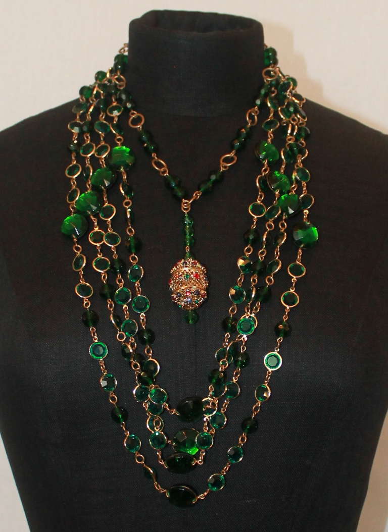 Erickson Beamon Green chicklet and crystal goldtone 5 strand necklace - Circa 80's. This magnificent vintage piece is in perfect condition. A true showstopper. 
Measurements:
Longest strand hangs 16.5