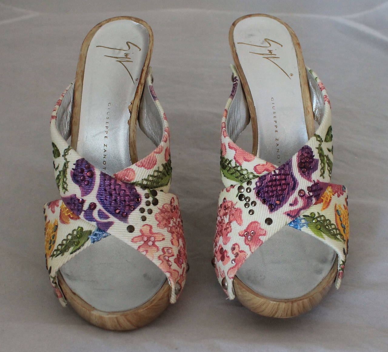 Giuseppe Zanotti Floral Print Rhinestone Wedges - 35. These wedges are in very good condition with some wear on the bottom. The wedge has a wooden look to it but is a plastic material.