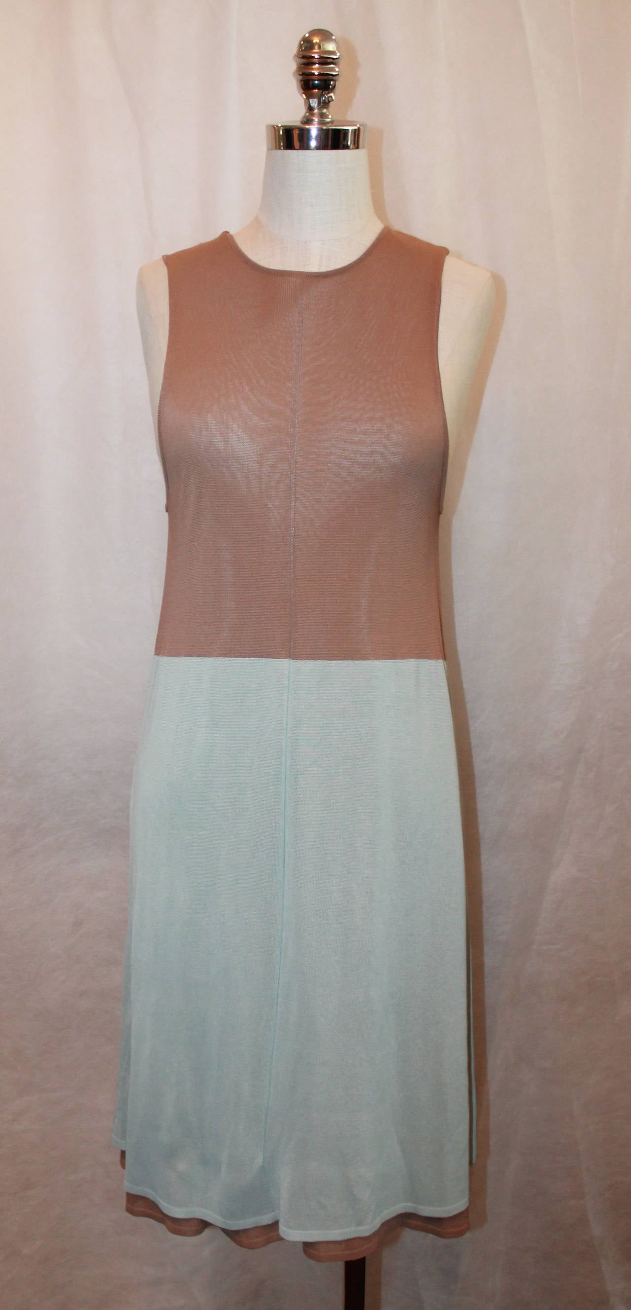 Balenciaga Tan and Pale Blue Color Block Loose Sleeveless Dress. There is a lining underneath the dress, and the arm hole falls longer than sitting right underneath the underarm. 

Measurements:
Bust: up to 32.5 "
Waist: up to 34