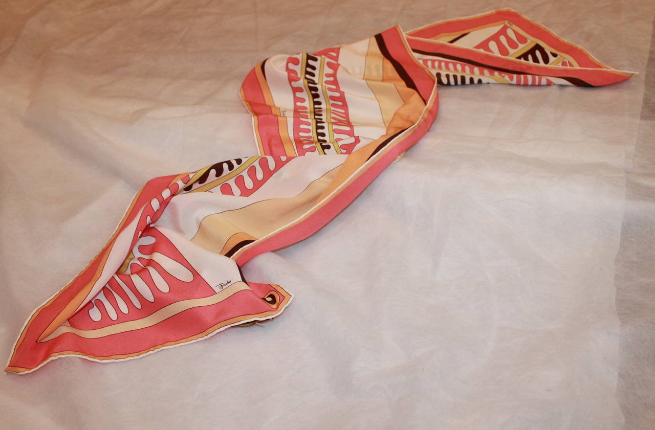 Emilio Pucci Pink, Orange & Brown Printed Geometric Scarf. This scarf is in excellent condition and is silk. 

Length- 53.75