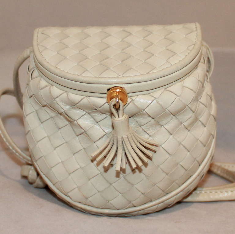 Bottega Veneta Ivory Cross-Body Handbag. This bag is in impeccable condition.
Measurements:
Length- 4.5