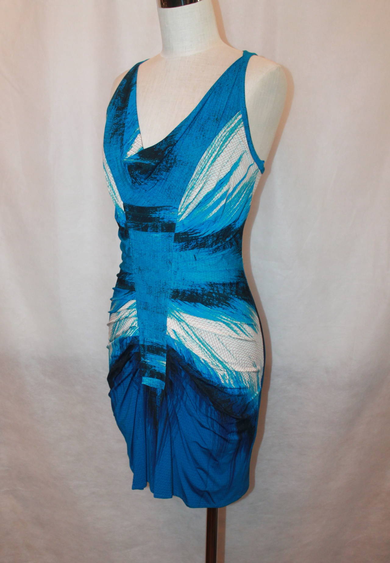 Roberto Cavalli Blue Ruched Sleeveless Short Dress - 4. This dress is in excellent condition and is a jersey type of material. It also has a slight cowl neck. 

Measurements:
Bust- 34