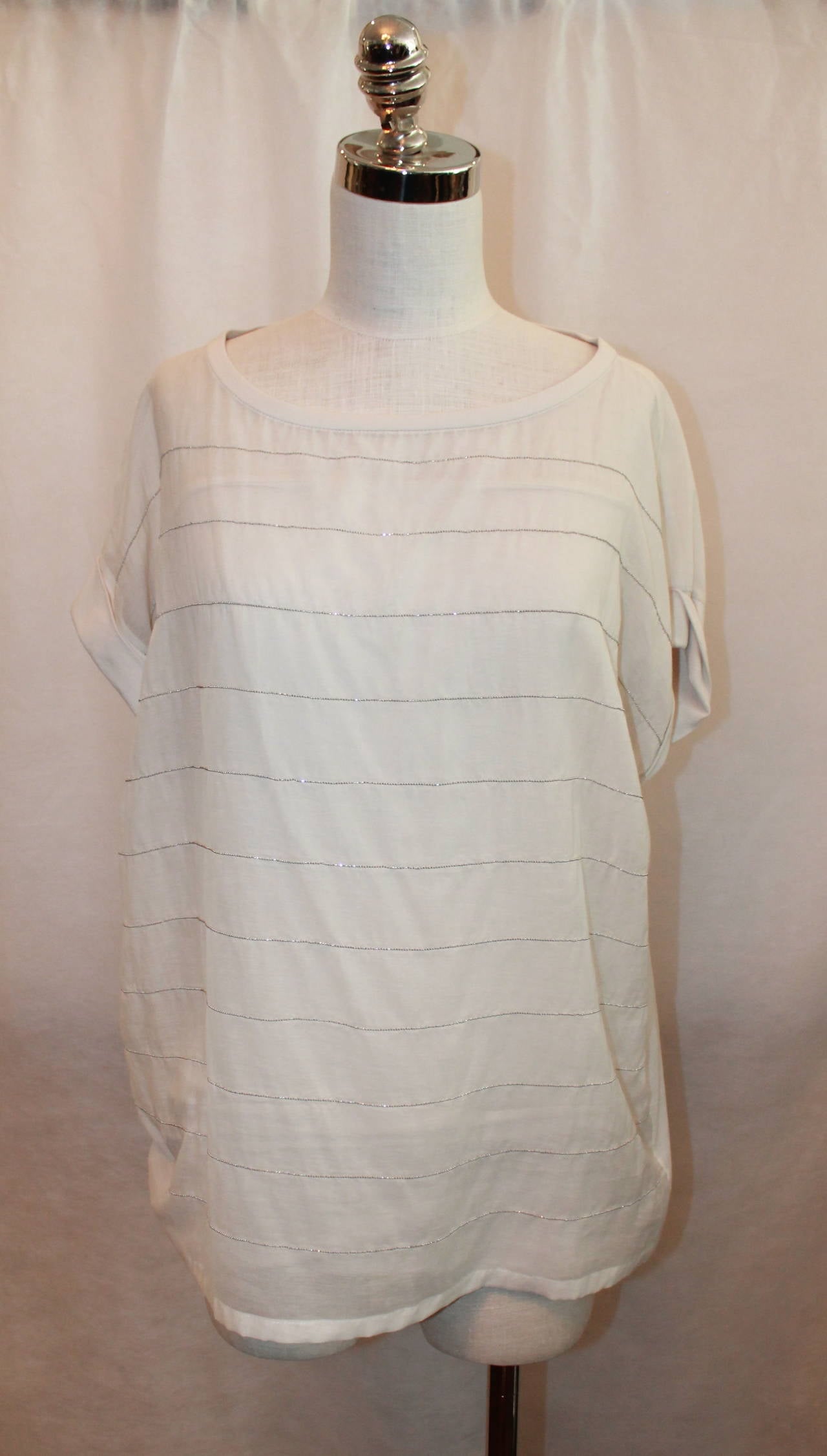 Brunello Cucinelli Ivory Loose Shirt with Tube Top - L. This shirt is in good condition with light use. The shirt has faint, small studded stripes. 

Measurements:

Tube Top
Bust- up to 34