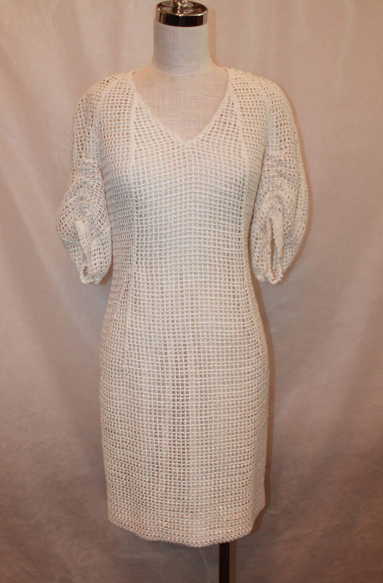Akris Ivory Crochet Sleeve Dress NWT - 6 - rt $2,990. This dress is new with tags with no wear visible. It has bell sleeves and is slightly tapered to the body. 

Measurements:
Bust- 34