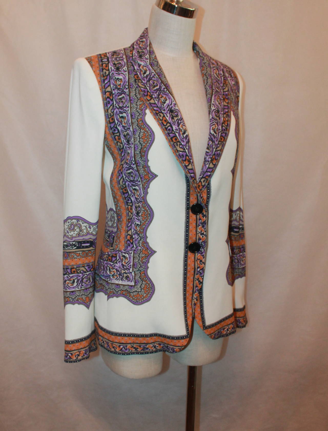 Etro White & Multi Color Printed Silk Jacket - 44. This jacket is in very good condition with light use. The print is orange, purple, and black with a white background. It has a very slight stain by the back of the neck on the left.