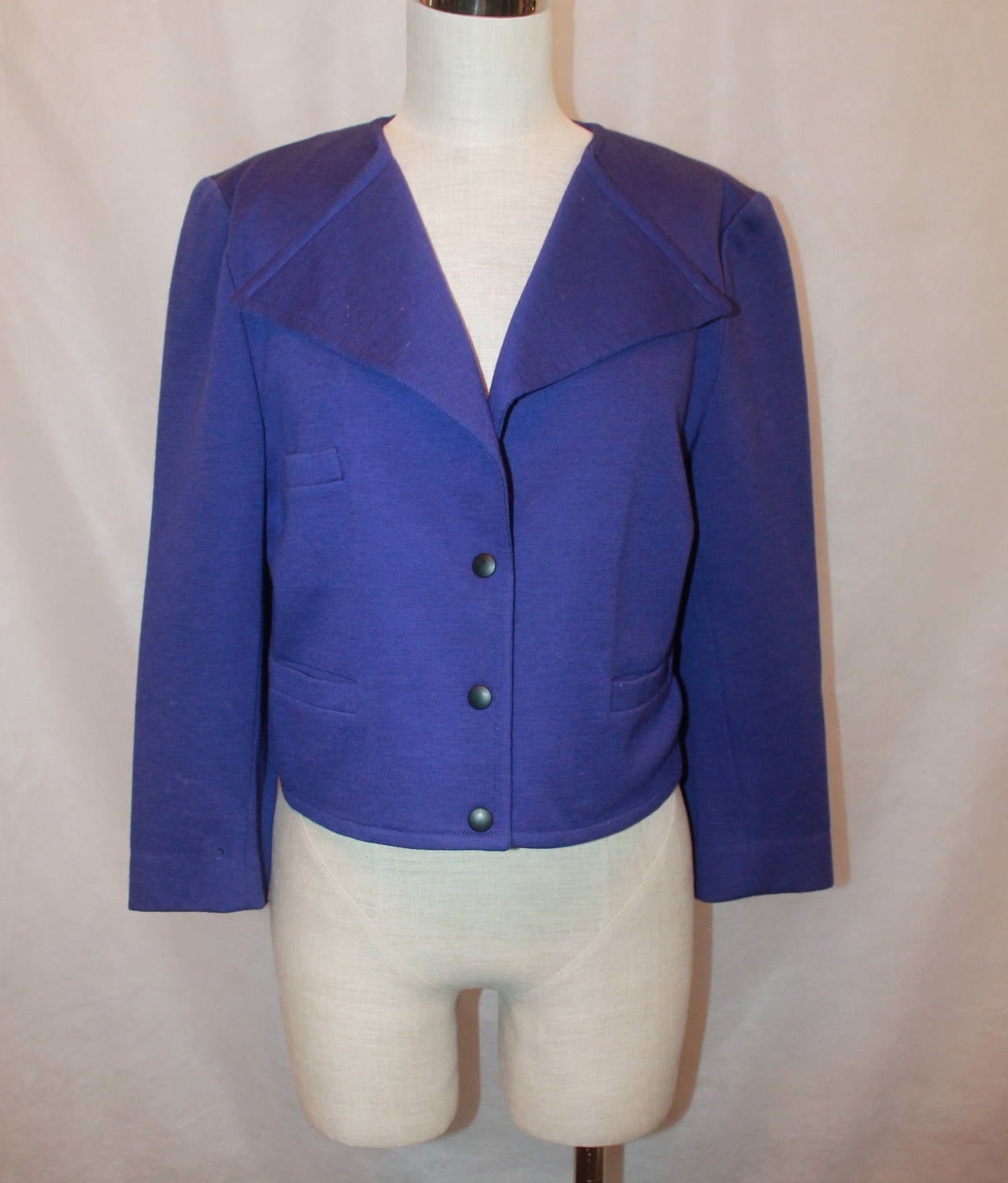 Sonia Rykiel 1980's Vintage Royal Purple Wool Jacket - M. This jacket is in excellent vintage condition with light use. It has a large collar and has 3 pockets. It also has snap buttons. 

Measurements:
Bust- up to 39