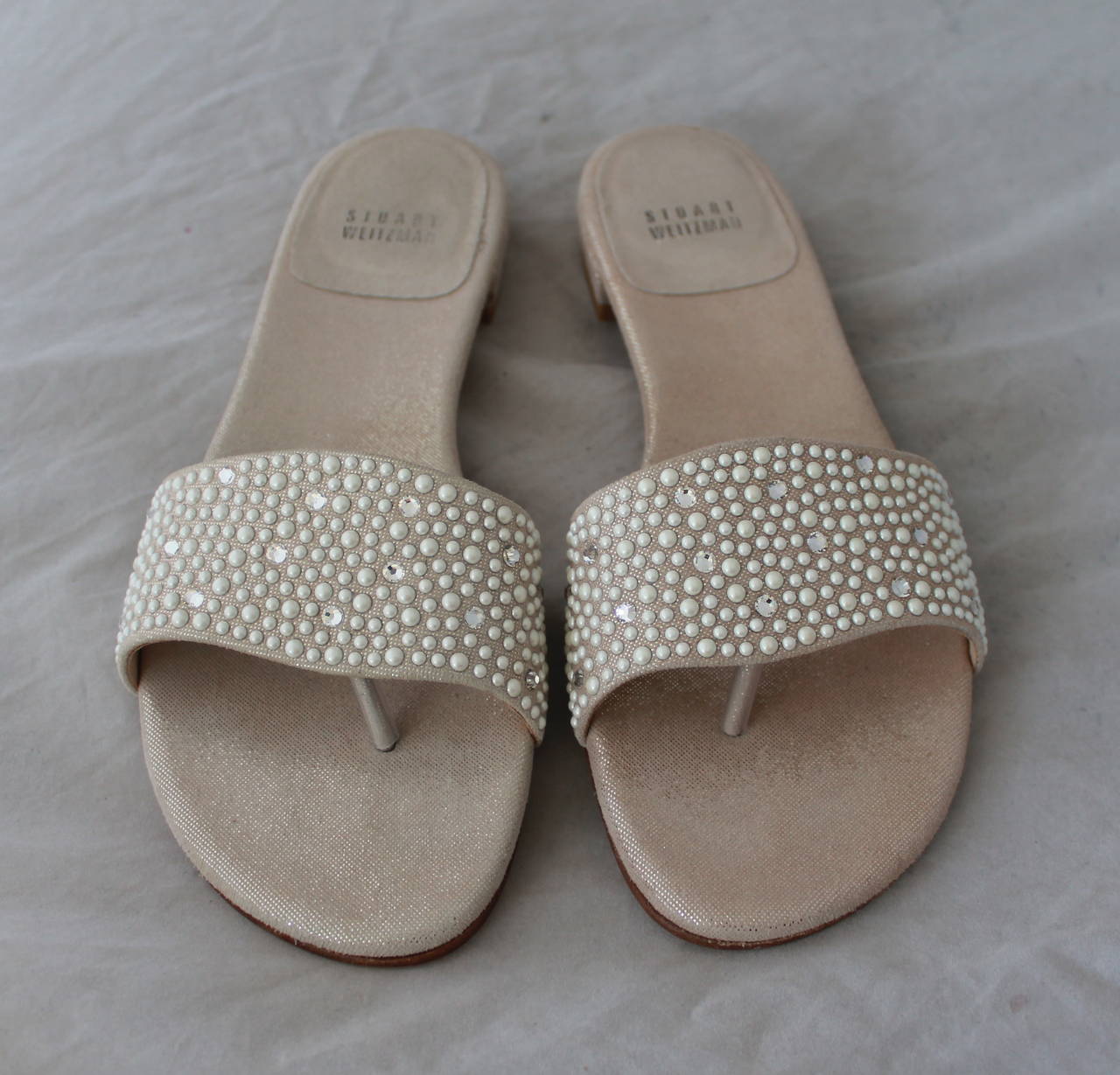 Stuart Weitzman Creme Fabric Sandals with Pearl & Rhinestone Detail - 7. These shoes are in excellent condition with barely any wear, some on the bottom.