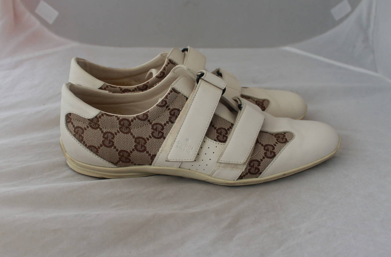 Gucci Brown Monogram & White Leather Velcro Sneakers - 41. These shoes are in very good condition with the only wear being on the bottom.