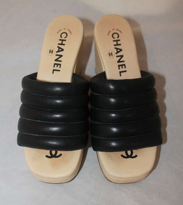 Chanel Black & Beige Quilted Lambskin Wedges. They are in very good condition with moderate wear on the bottom. Size 36.