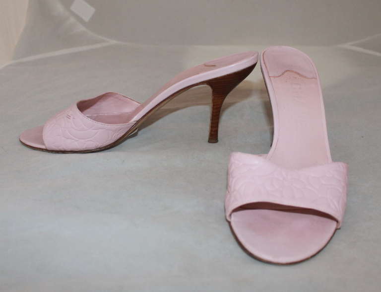 Chanel Pink Monochromatic Slide Heel. The shoe has a floral & 