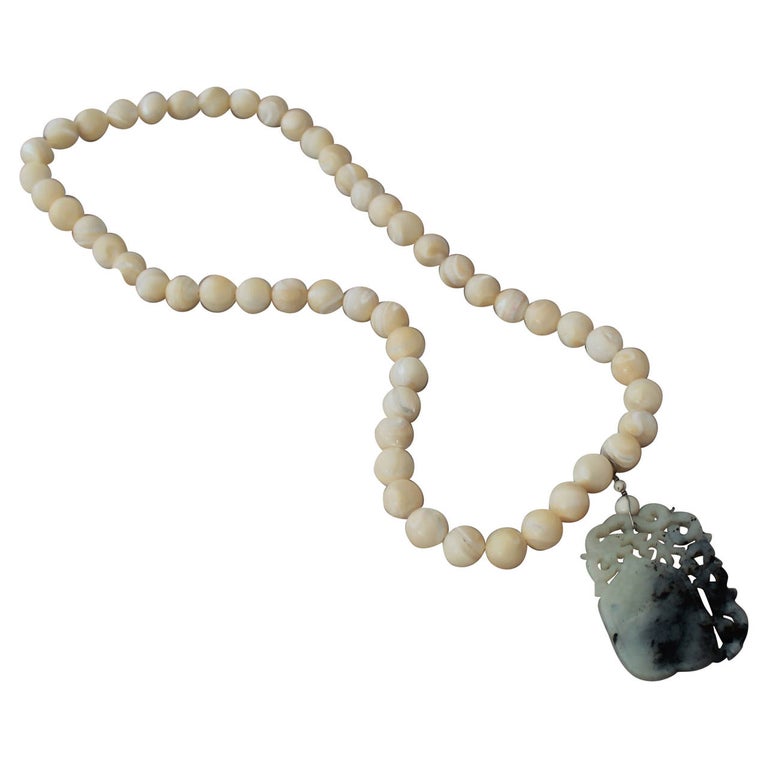 2000's Mother of Pearl Necklace with Carved White Jade Pendant For Sale