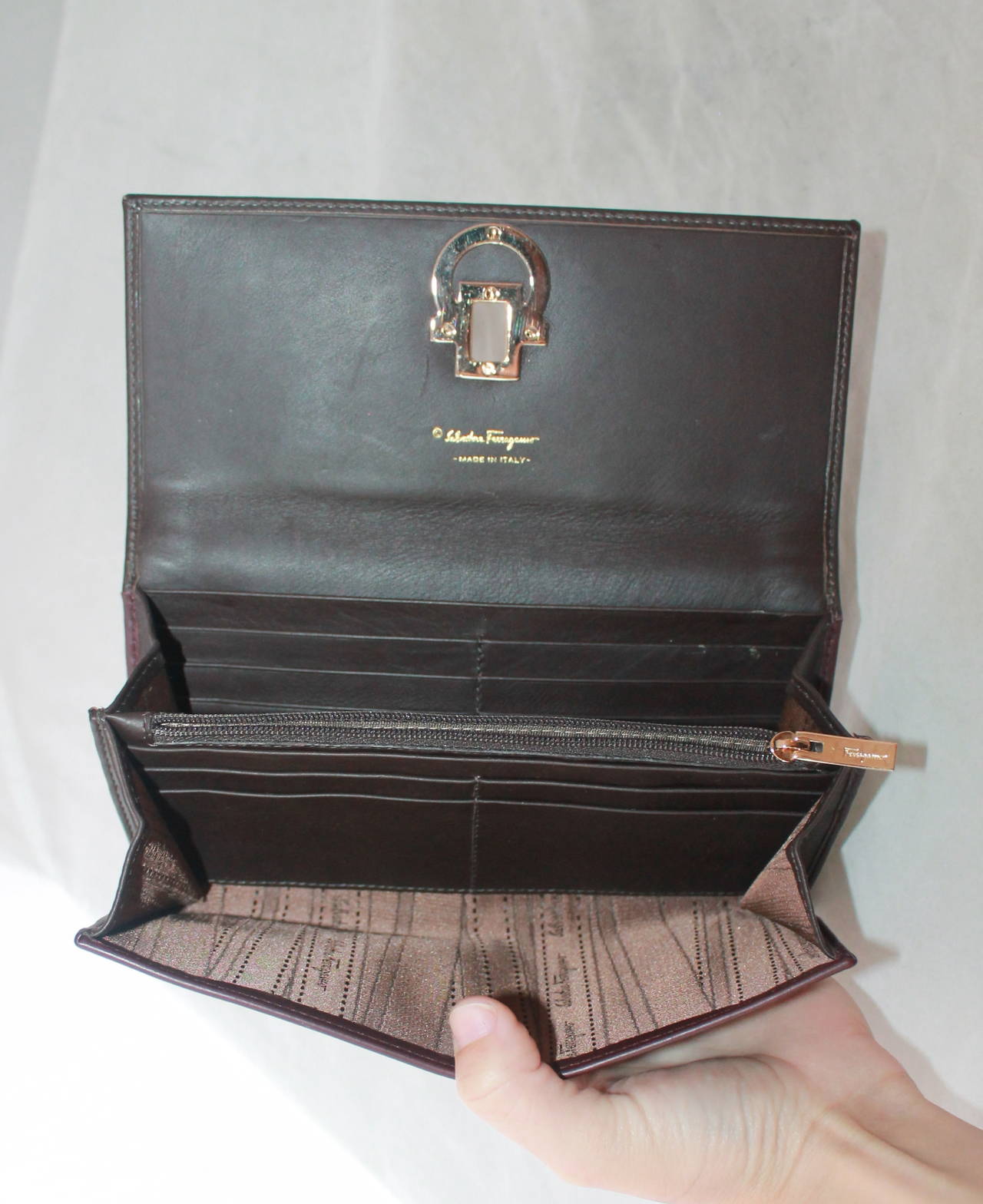 Salvatore Ferragamo Eggplant Leather Wallet with Box GHW In Fair Condition In West Palm Beach, FL