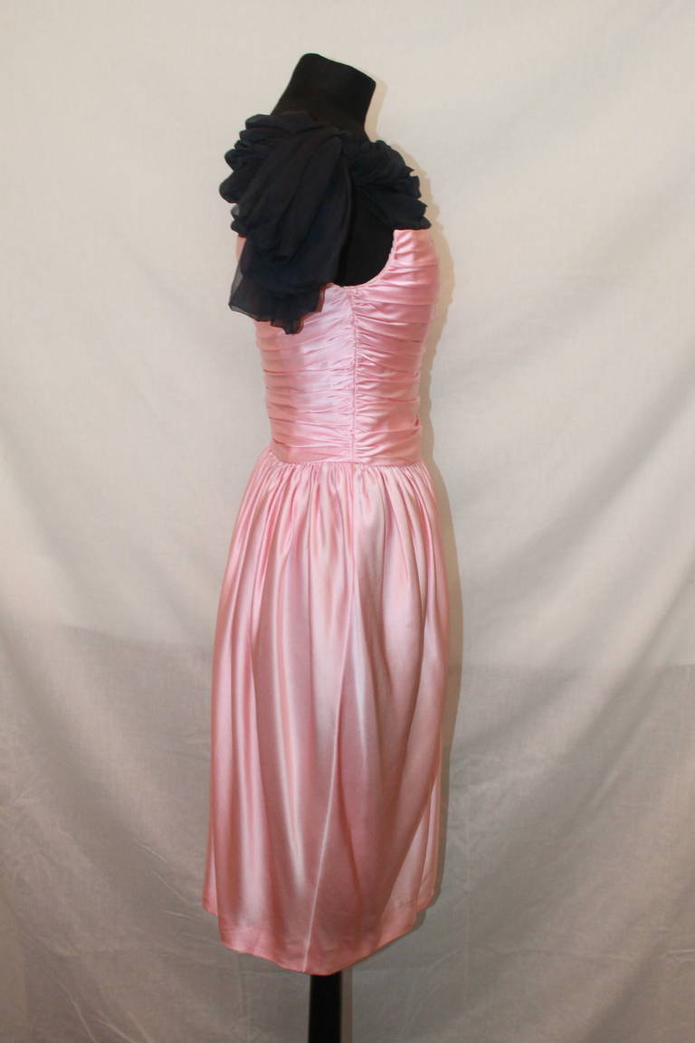 Lanvin Vintage Pink & Navy Dress - 4. This silk & silk chiffon dress has a ruched bodice with a pleated skirt. It is circa 1970s and in impeccable condition.

Measurements:
Bust- 26