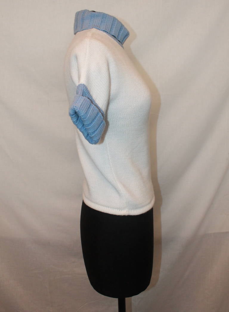 Courreges Baby Blue & White Turtleneck Top - S. This wool blend short- sleeve top is in excellent condition. 

Measurements:
Bust- 33