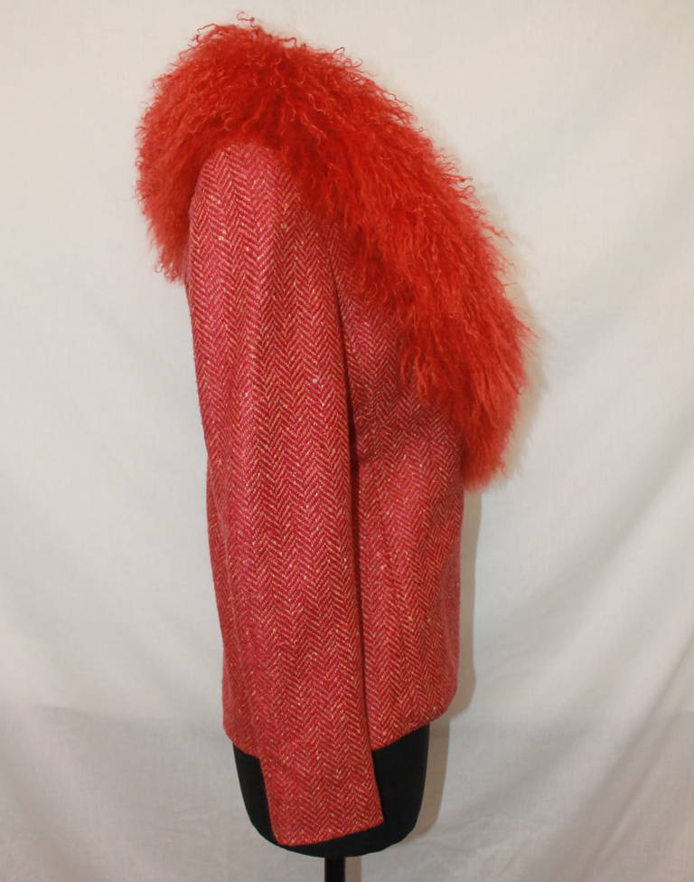 Valentino Orange Tweed Fur Jacket - M. This jacket is in impeccable condition and is wool. Circa 1990s. The fur is believed to be real and not faux, although we are not sure exactly what it is.

Measurements:
Bust- 35.5