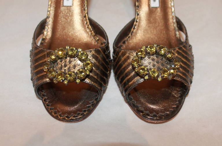 Manolo Blahnik Olive Metallic Jeweled Heels - 38. These skin printed heels are in excellent condition with minor wear on the bottom of the shoe.