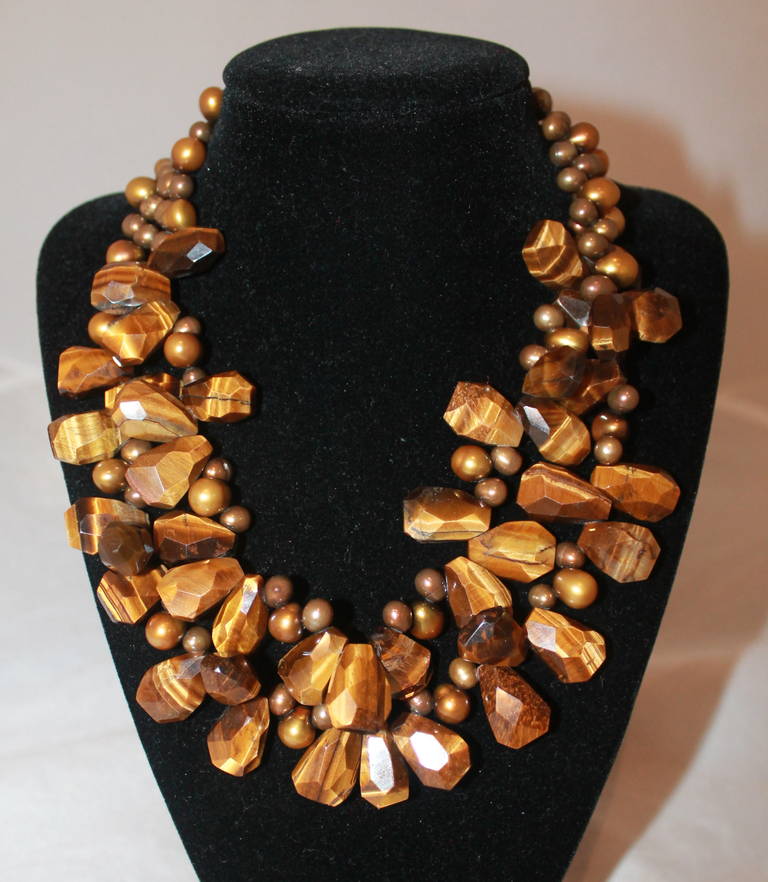 Unknown Fresh Water Pearl & Tiger Eye Necklace. This necklace is in excellent condition with a sliding clasp.

Length- 16.5