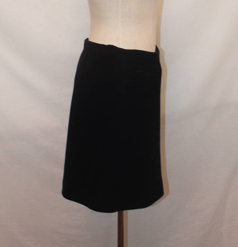 Chanel Black Skirt w/ Front Zippers - 42. This cotton blend skirt is in impeccable condition. Circa 2001.

Measurements:
Waist- 31