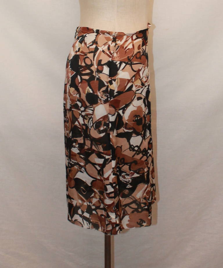Chanel Earthtoned Printed Silk Skirt - 36. This brown & black skirt is in impeccable condition. Circa 2005.

Measurements:
Waist- 29