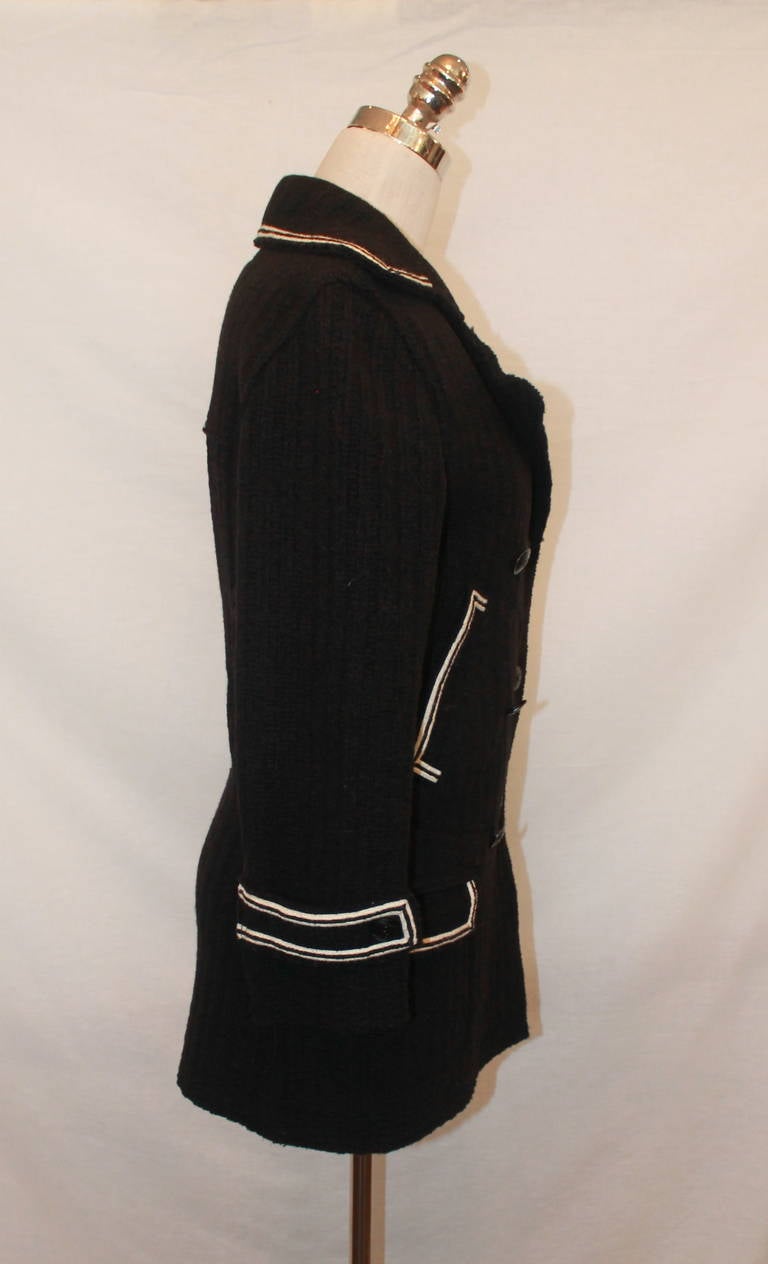 Chanel Black & White Wool Pea Coat - 36. This pea coat is in excellent condition and has an ivory trim.

Measurements:
Bust- 36