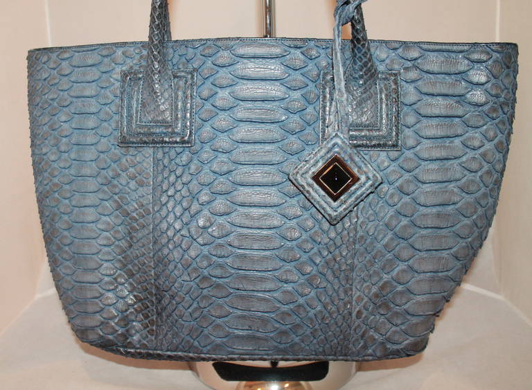 Kara Ross Blue Snake Tote. This bag is in impeccable condition.

Measurements:
Height- 11.5