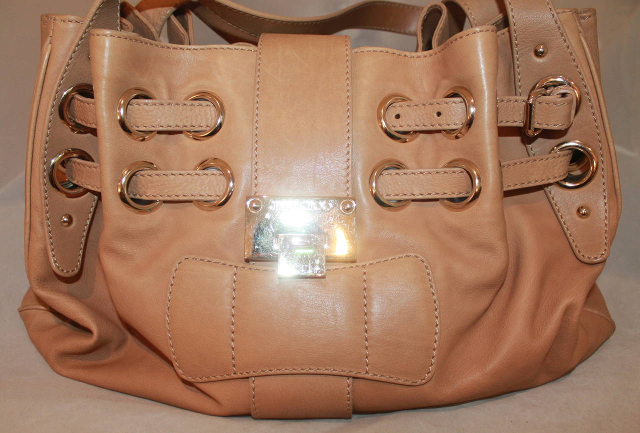 Jimmy Choo Tan Ramona Handbag. This handbag is in excellent condition with very minor markings. 

Measurements:
Length- 11