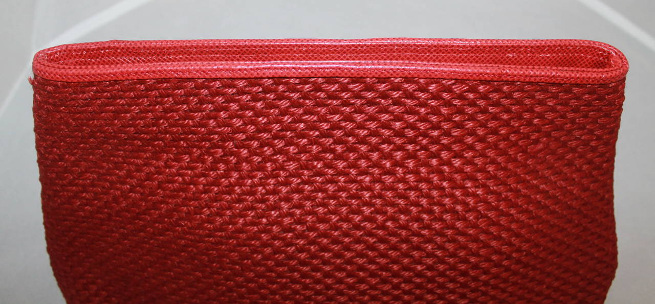 Bottega Veneta Vintage Red Raffia & Lizard Trim Oversize Clutch. This clutch is in impeccable vintage condition and comes with a duster.

Measurements:
Length- 8.5