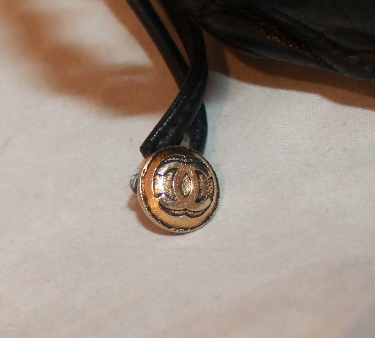 Women's Chanel Black Lambskin Quilted Mini Drawstring Handbag - circa 1997