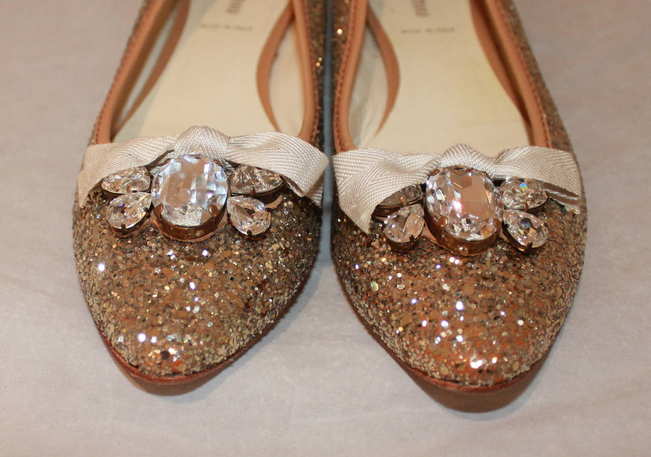 Miu Miu Gold Shimmer Rhinestone Flats - 40. These shoes are in excellent condition with minor wear on the bottom.
