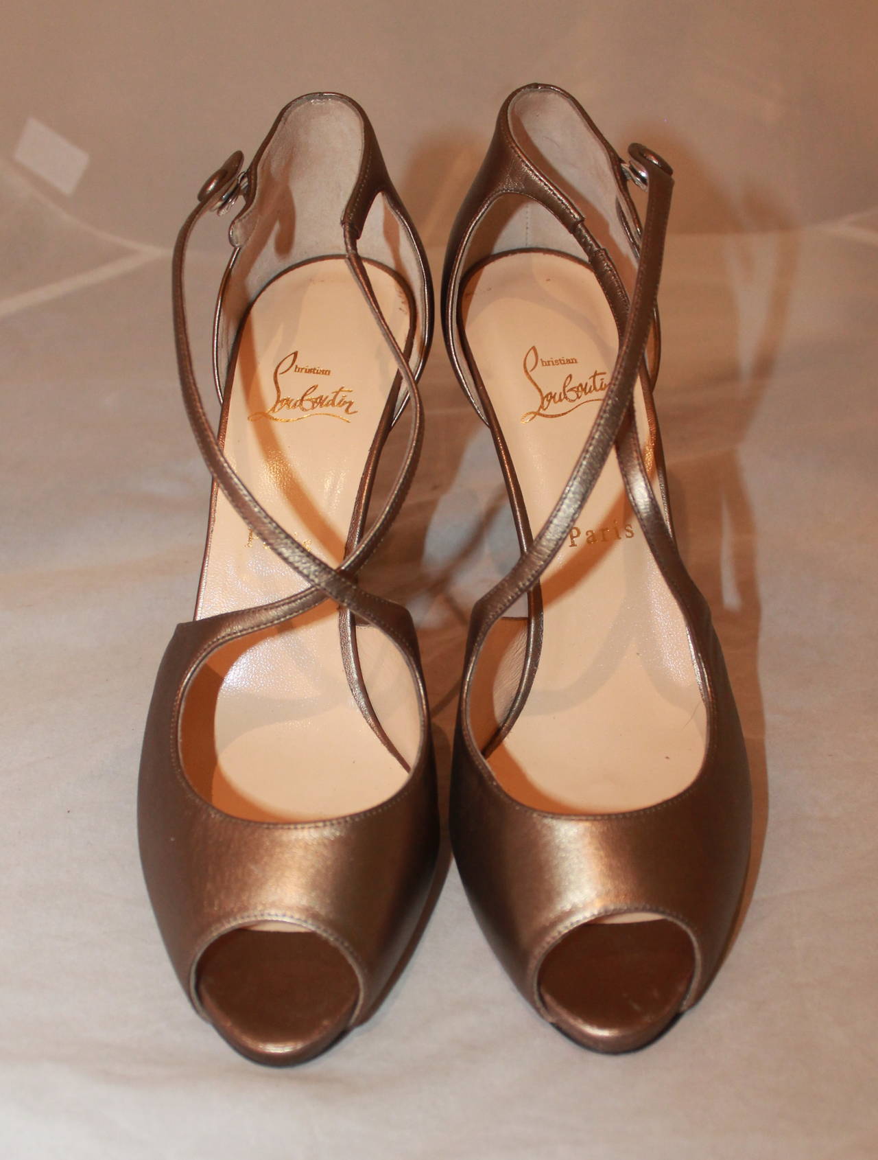 Christian Louboutin Bronze Leather Peep Toe Shoes - 42. These shoes are in excellent condition and have never been worn.