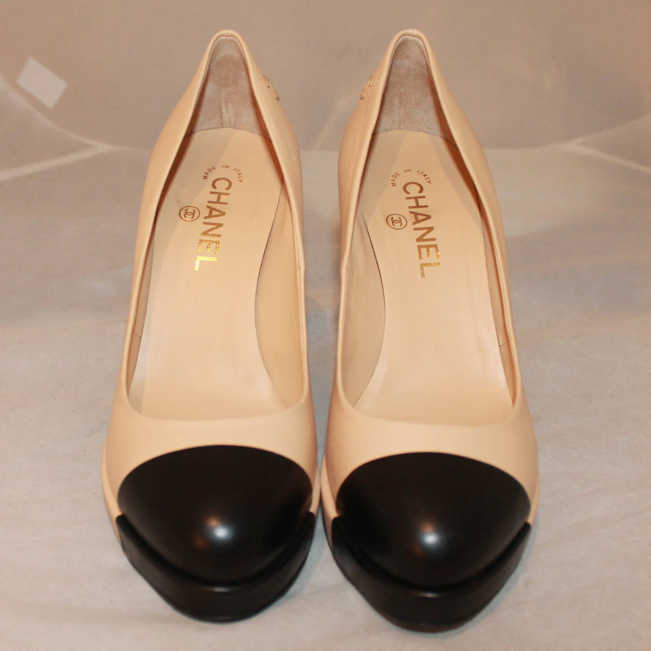 Chanel Black & Tan Shoes with Platform - 39.5. These shoes are in excellent condition with little to no wear on the bottom. They have no marks on the leather.