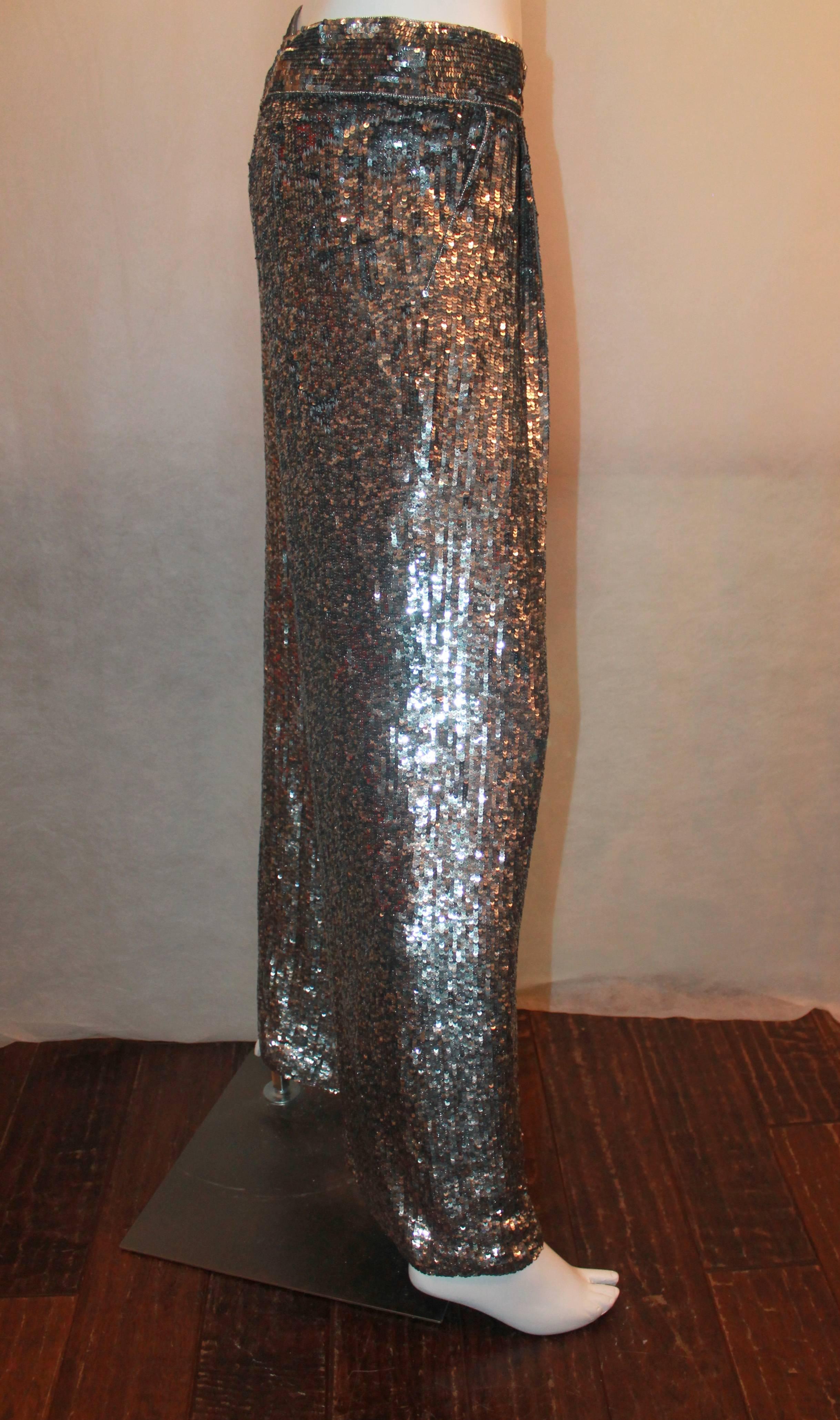 Escada Silver Sequin Palazzo Evening Pants - 34. These pants are NWT and retailed for $5,790 and a sale price of $2,899. There are two types of sequins on this piece: silver & and black sequin with silver polka dots as seen on image 4 making the