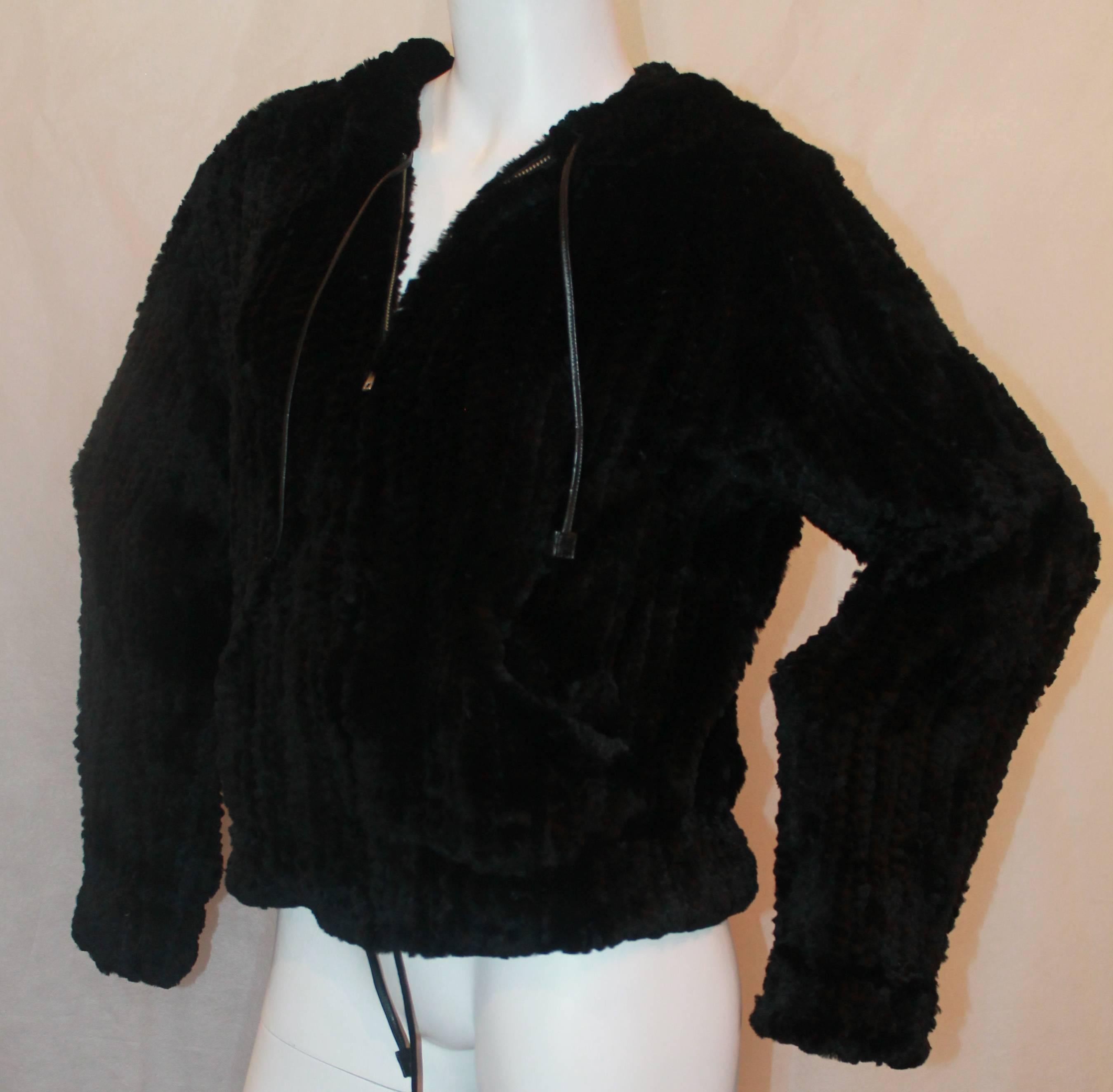 Sonia Rykiel Black Rabbit Knit Fur Zip Up Jacket w/ Hood - Medium - Circa 90's.  This beautiful piece is in excellent condition.  It features extremely soft rabbit fur and leather drawstrings on the hood and bottom to cinch it.  It has two
