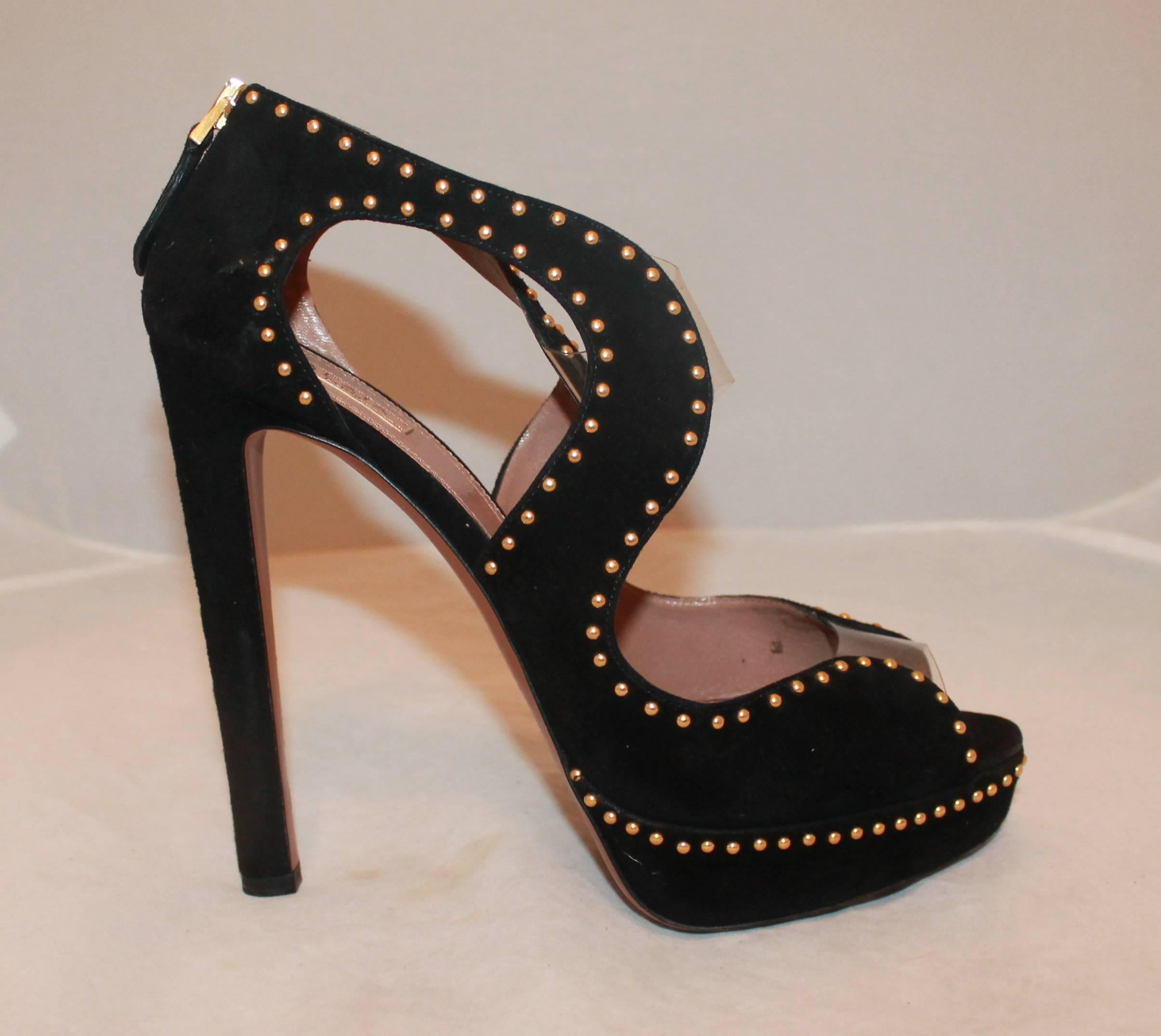 Alaia Black Suede Cutout Platform Heels w/ Small Gold Studs - 40.5.  These striking heels are in excellent condition with only minor markings on the heel.  They feature a unique cutout w/ two plastic sections, open toes, and small gold studs along