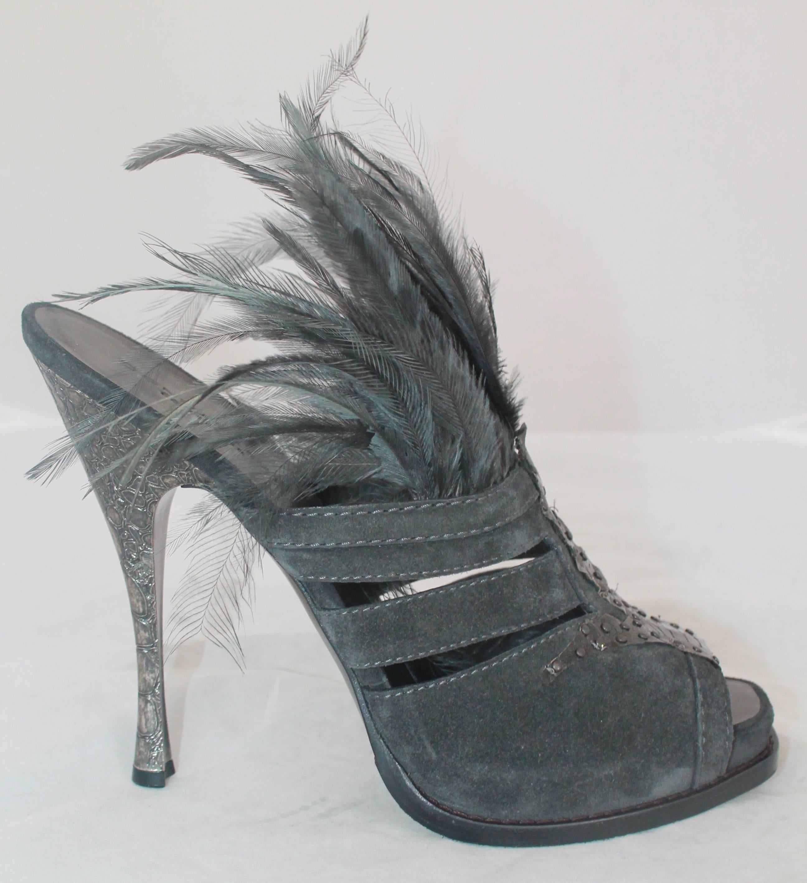 Donna Karan Collection Charcoal Suede, Snake Skin, & Feather Slide Heels - 41.  These gorgeously extravagant heels have never been worn.  They feature black snake detail, feathers on the top section, and embossed croc metal heels.  These are a very