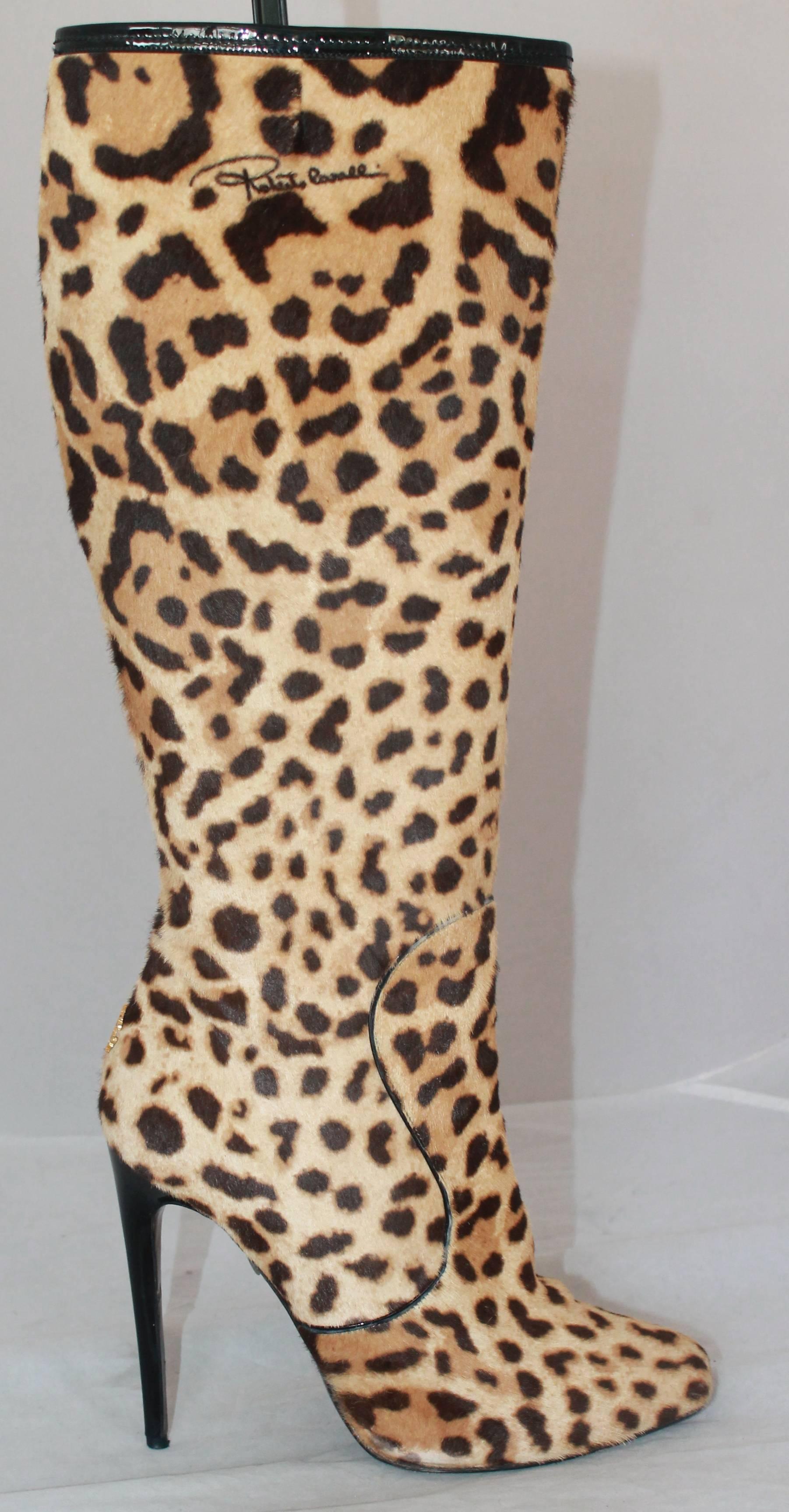 Roberto Cavalli Leopard Print Pony Hair Knee High Stilleto Boots - 40

These boots are in good condition with very noticeable wear on the heels and bottom of boot. They are pony hair with a patent trim around the boot and on the heel.