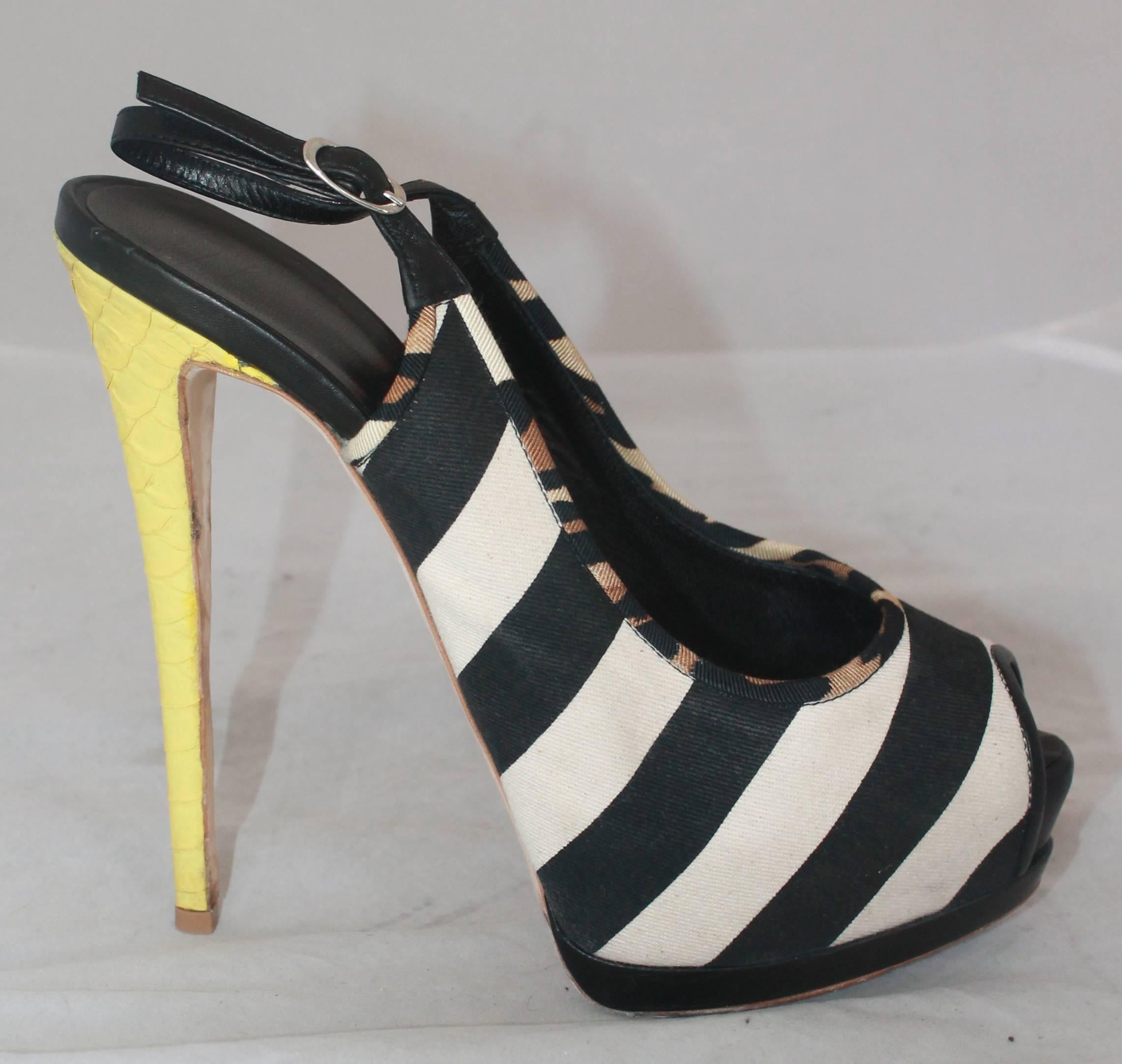 Guiseppe Zanotti Black & White Canvas w/ Yellow Python Platform Slingbacks - 41 .  These fun platform slingbaks are in good condition, they have noticeable wear on the sole and the canvas portion is dirty, but can be cleaned.  They feature a black