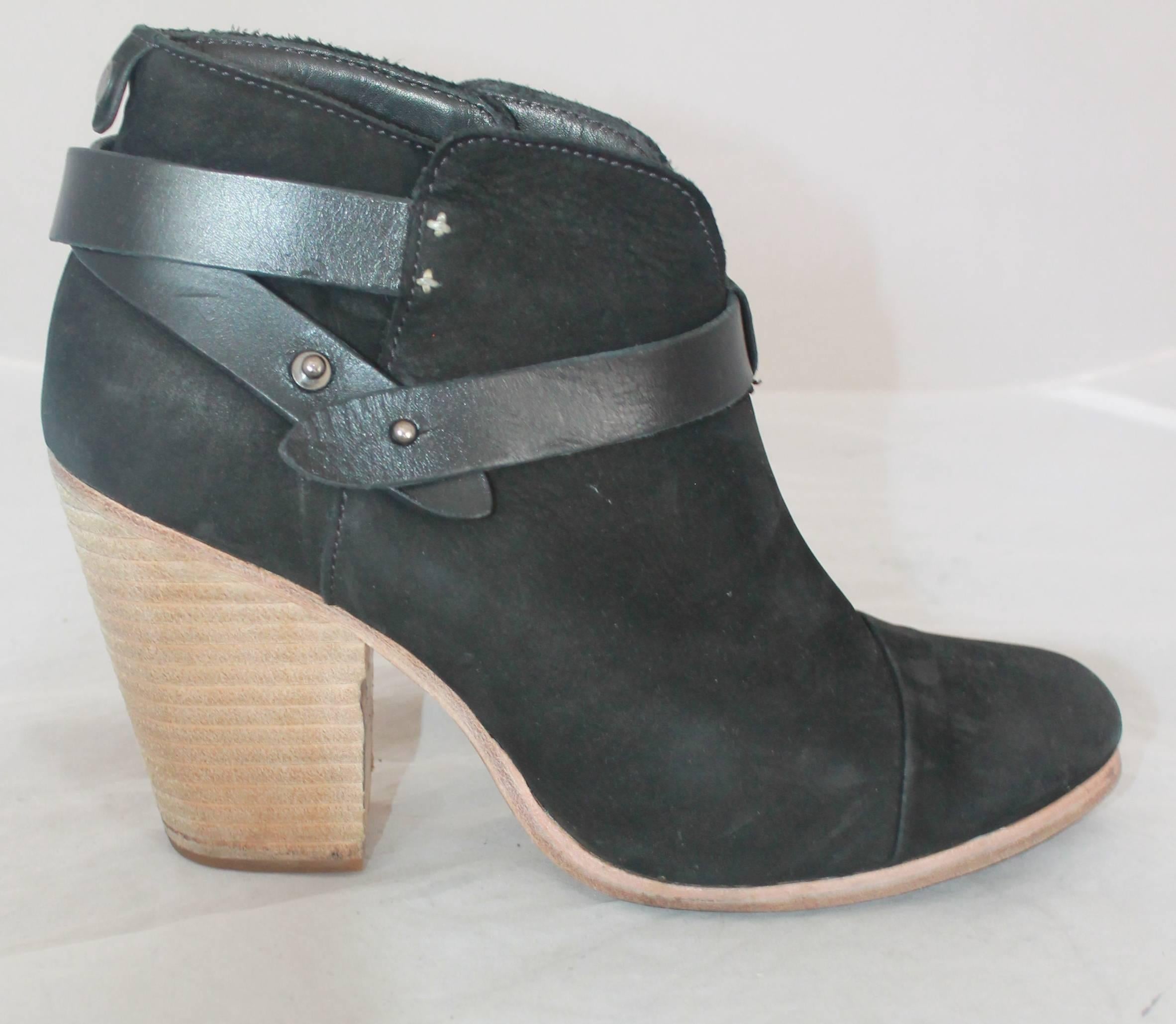Rag & Bone Black Suede Black booties w/ Leather Wrap-Around Strap - 41.  These adorable booties are in good condition with only some noticeable wear on the sole and suede.  They feature black wrap-around straps on the top and a wooden
