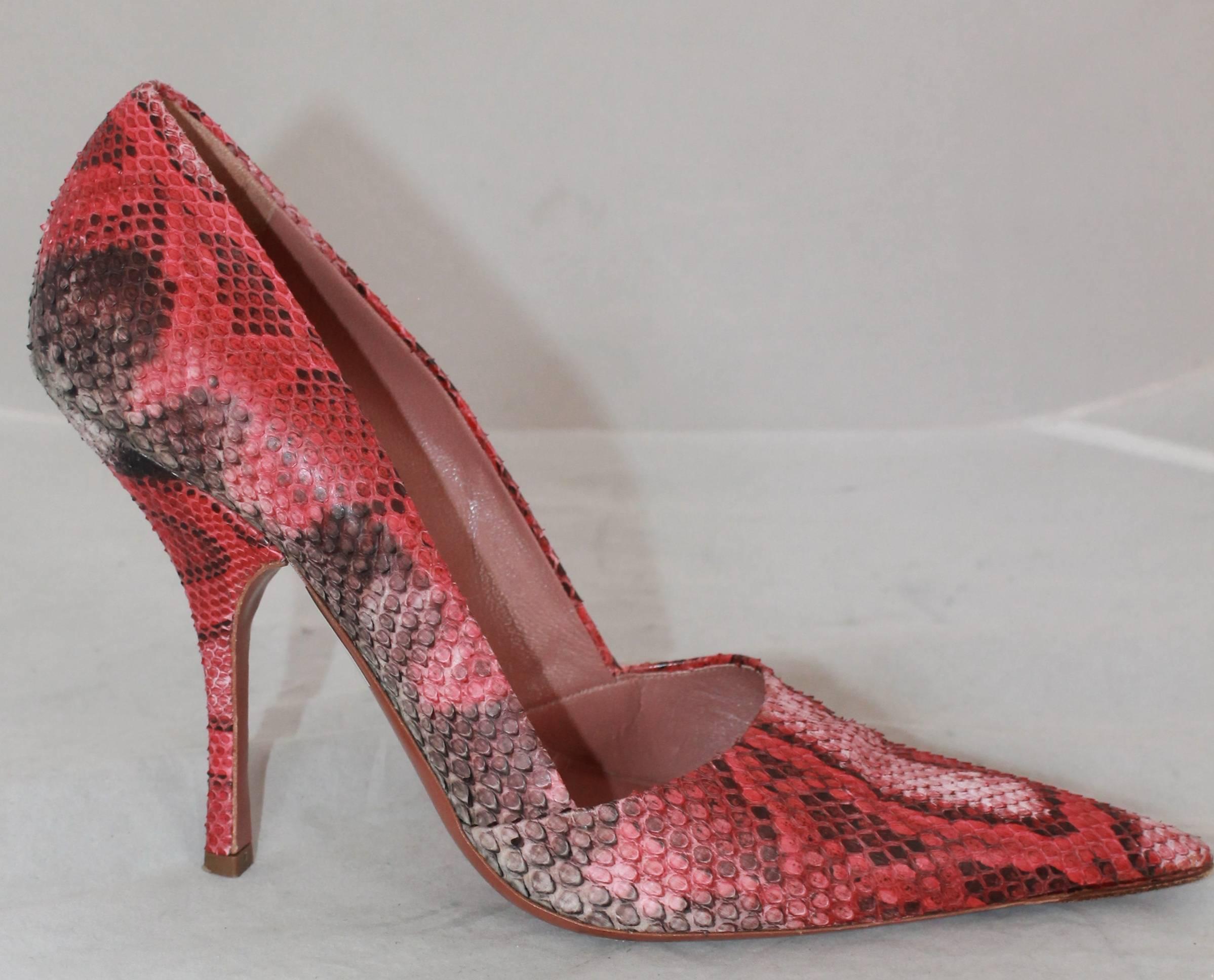 Alaia Red & Black Snake Skin Pointed Toe Pumps - 41.  These uniquely beautiful pumps are in good condition with some noticeable wear on the heel and soles.  These pumps features an ombre effect with some areas being lighter or darker than
